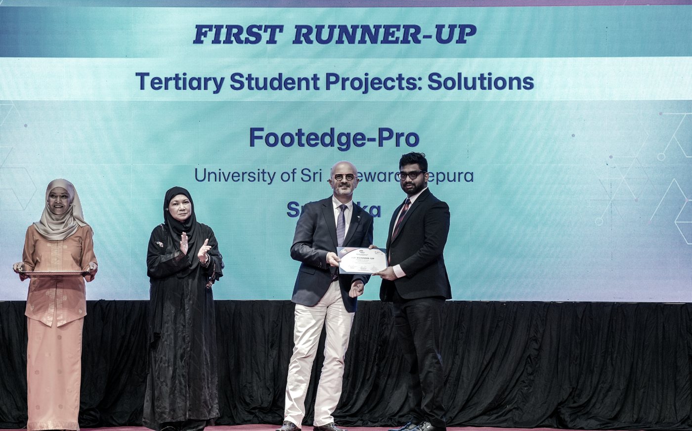 Nirodya Pussadeniya receiving the First Runner-Up award for FootEdge Pro at the Asia Pacific ICT Alliance Awards 2024 in Bandar Seri Begawan, Brunei Darussalam